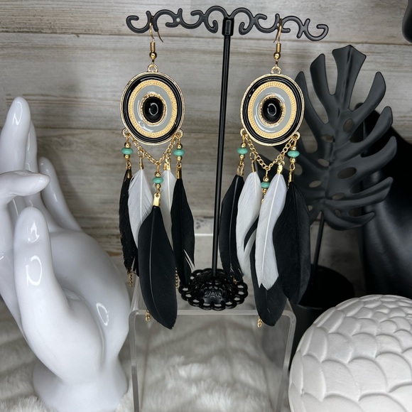 Jewelry - NWT black and white boho feather earrings.